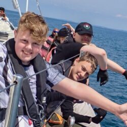 Young people waving
