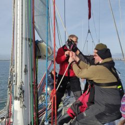 Adults sweating sails
