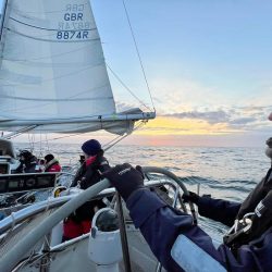 Robert Munns at the helm