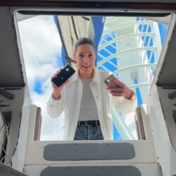 Ellie on challenger holding phone