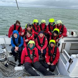 group photo in wet weather wear