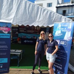 hannah and jen at stand