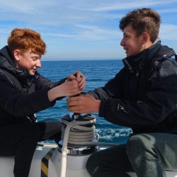 two boys winching