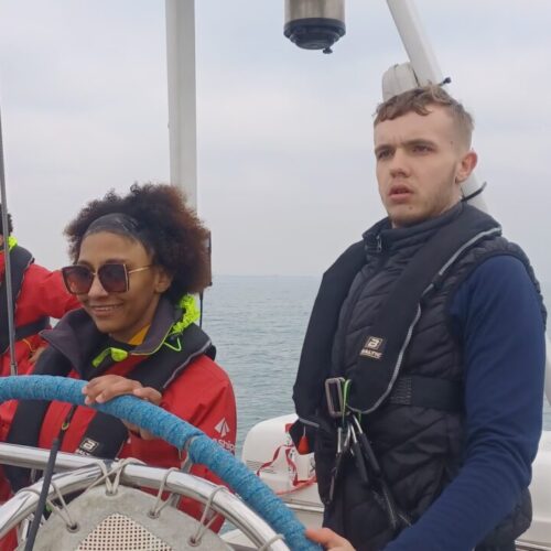 young people at the helm