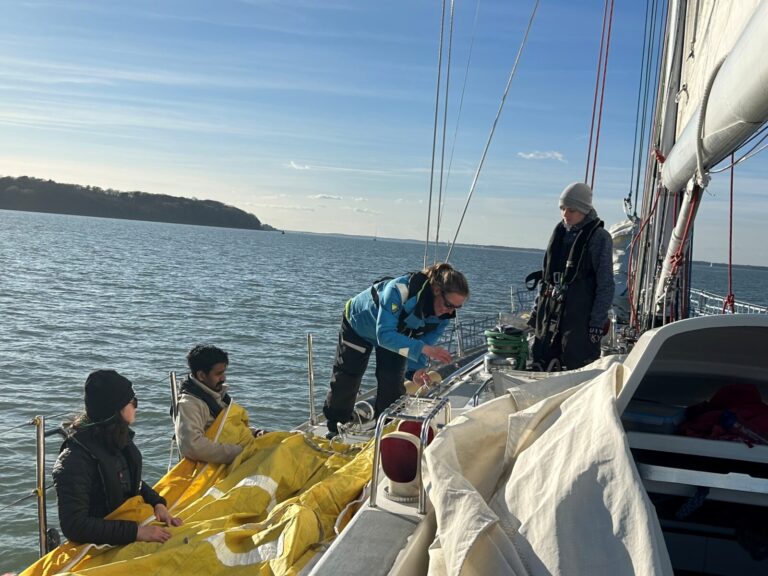 crew training anna teaching flaking sail