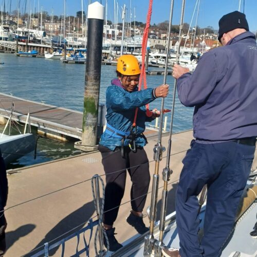 young person in harness
