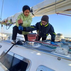 two young people winching