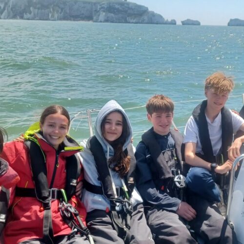 Young boys and girls ages 12-15 sailing during May half term