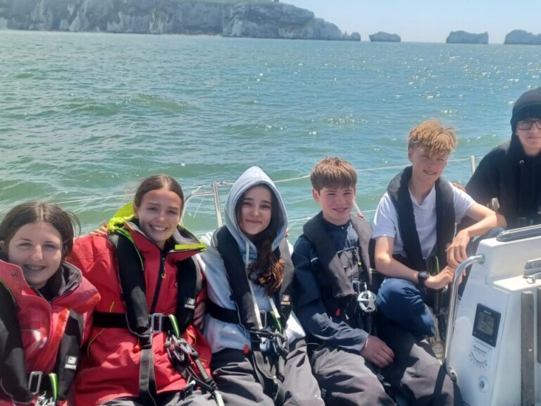 Young boys and girls ages 12-15 sailing during May half term