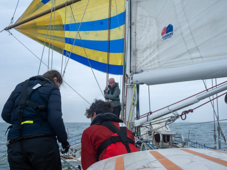 Learning how to fly the spinnaker sail in ocean racing