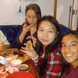 Young 12-15 years old sailing on a 72 foot challenger yacht